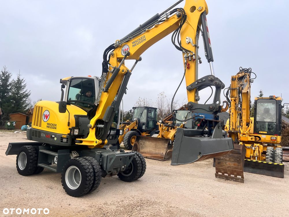 Wacker Neuson EW65 Koparka Kołowa 6503 7ton wacker NEUSON 3x łyżki LEHNHOFF 4690 mth Pług Ramię Long 3 Łamane KLIMA,MS03 HYDRAULICZNE TEREX VOLVO Cat Jcb Liebherr Komatsu KLIMATYZACJA 1 właściciel Ew 65 6 ton Takeuchi TB 370 Yanmar B75w MECALAC 7 8 MWR - 17