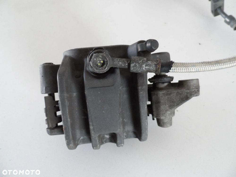HONDA CBF 600 N zacisk hamulcowy przód P,L - 6