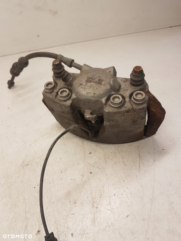 ZACISK HAMULCOWY LEWY PRZÓD AUDI A4 B8 A5 8K0105K - 2