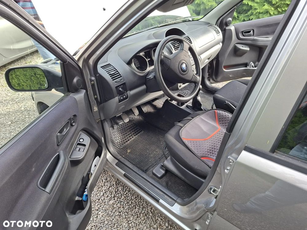 Subaru Justy - 12