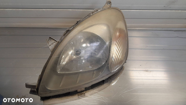 Toyota Yaris I Lampa przednia lewa