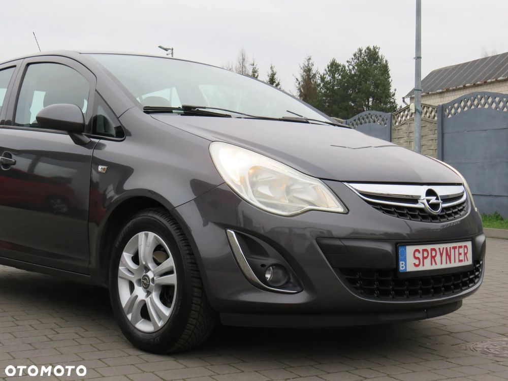 Opel Corsa 1.2 16V Cosmo - 8