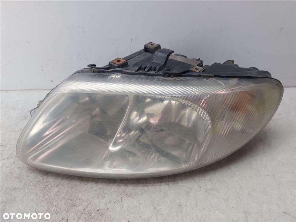 Reflektor lampa przód lewa Chrysler Grand Voyager 04857703AB - 4