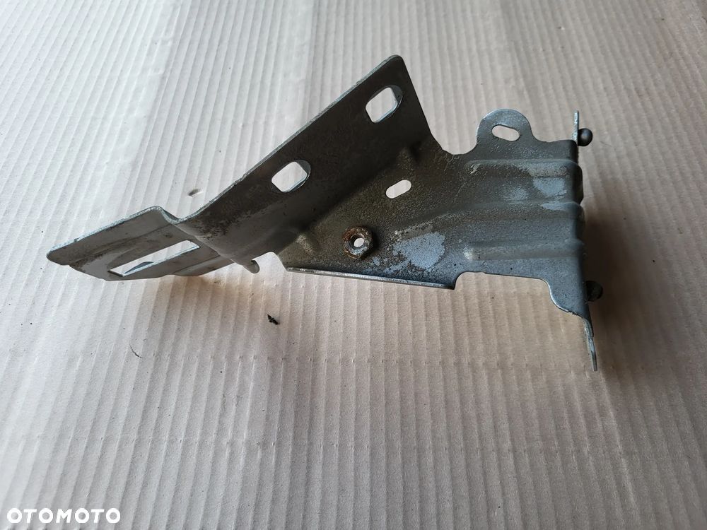Wspornik mocowanie błotnika lewego przedniego Peugeot 208 I EZR - 3