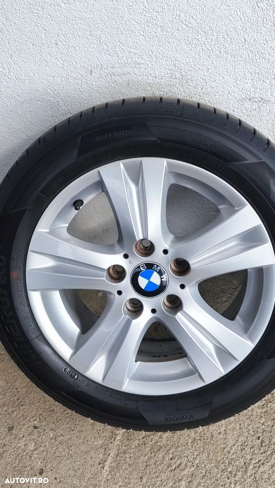 Set jante BMW style 222 dedicate e81/87 7j16et44 cu anvelope vara 205/55/15 - 5