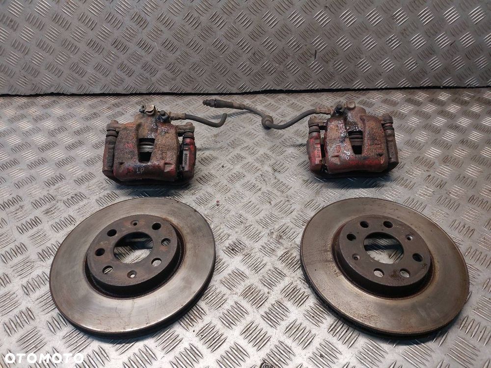 TARCZE HAMULCOWE TYŁ + KLOCKI + ZACISKI FIAT GRANDE PUNTO I 1.4 8V - 1
