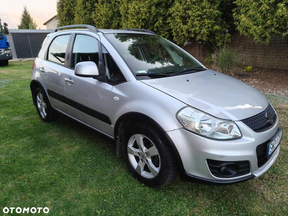 Suzuki SX4 1.6 Comfort Plus - 9