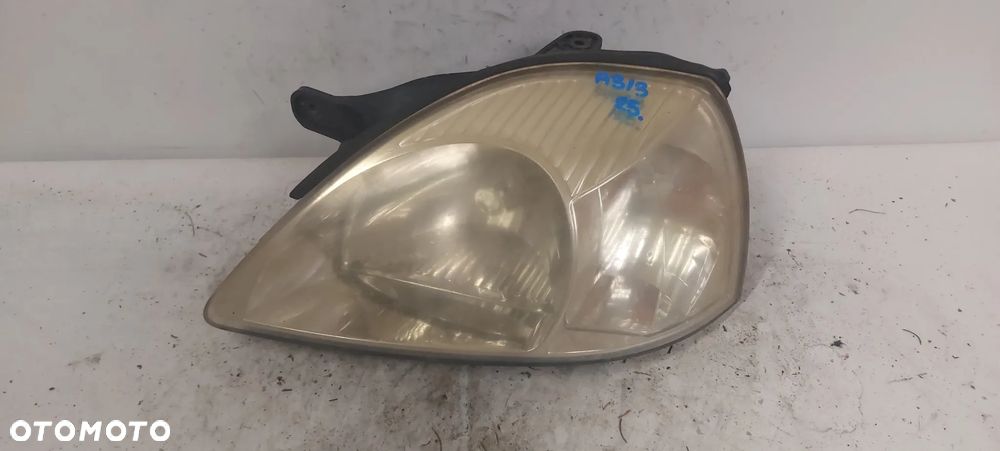 .  PRZOD PRZEDNIA LAMPA LEWA KIA RIO 1 - 1