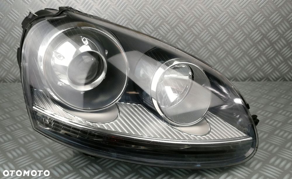 1K6941032 reflektor lampa prawa prawy przód przednia VW GOLF V JETTA XENON - 1