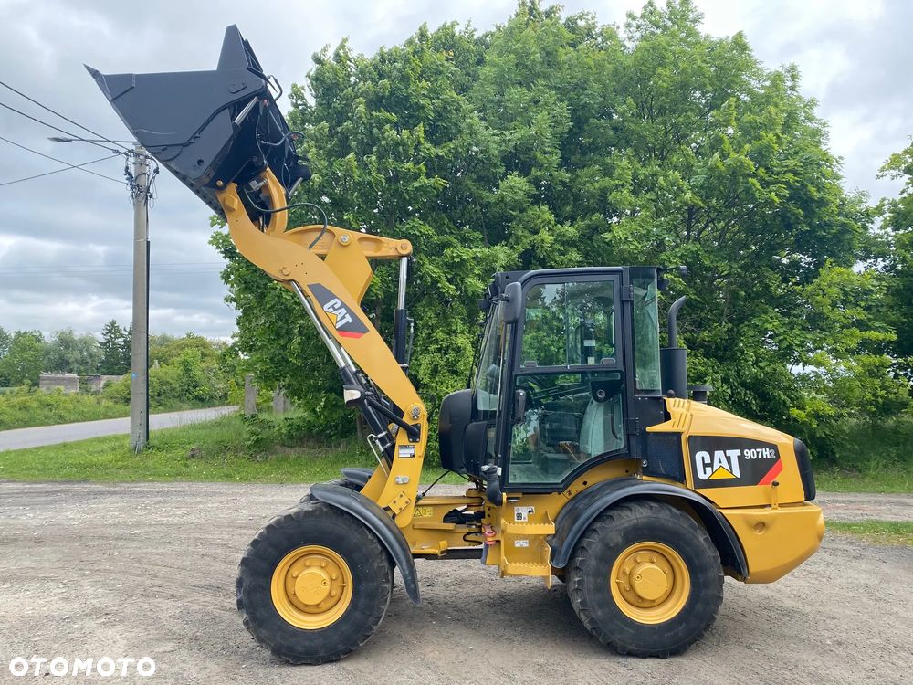 Caterpillar CAT 907H2, 2014 ROK, 4900 MTH, ŁYŻKA OTWIERANA + WIDŁY, z NIEMIEC, - 19