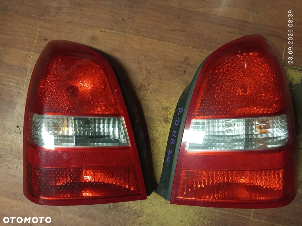 LAMPA TYLNA NISSAN PRIMERA P12 HB LEWA LUB PRAWA