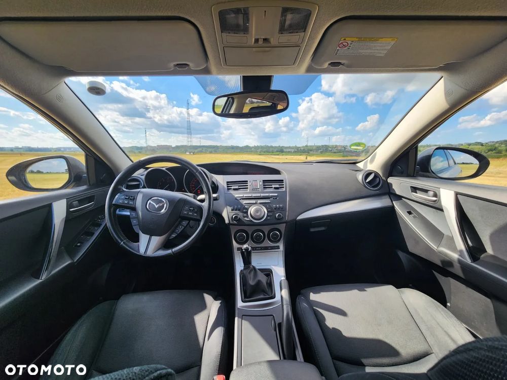 Mazda 3 2.0 Exclusive + - 15