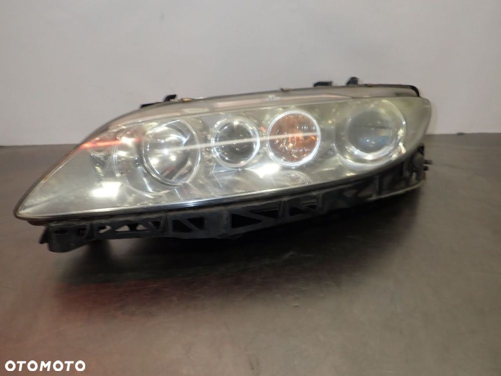 LAMPA LEWA PRZEDNIA SOCZEWKA MAZDA 6 I - 1