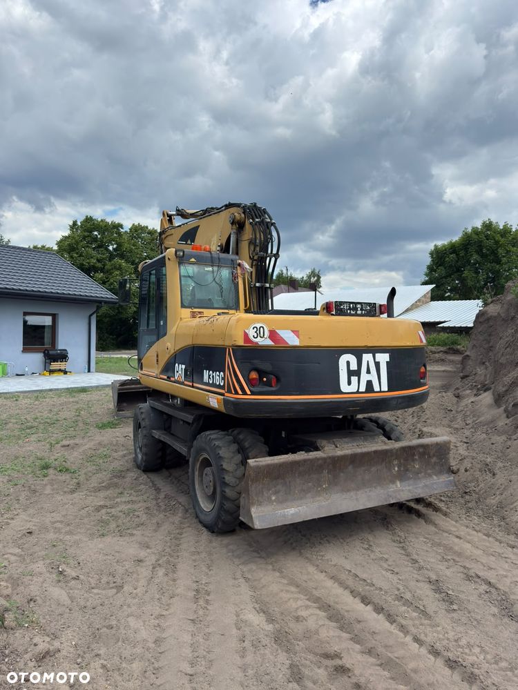 Caterpillar M316C - 3