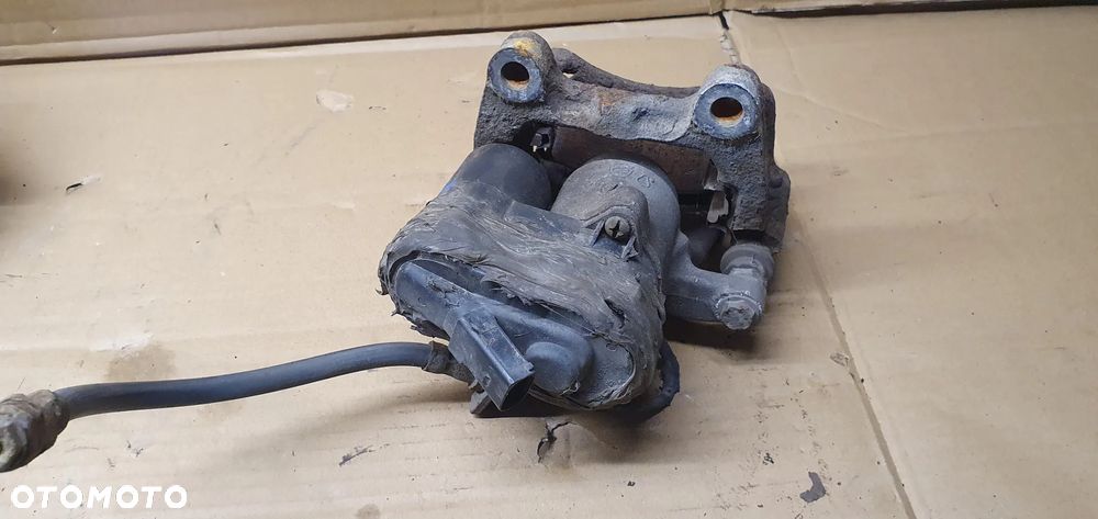 Zacisk hamulcowy prawy tył tylny prawy VW Passat B6 - 7