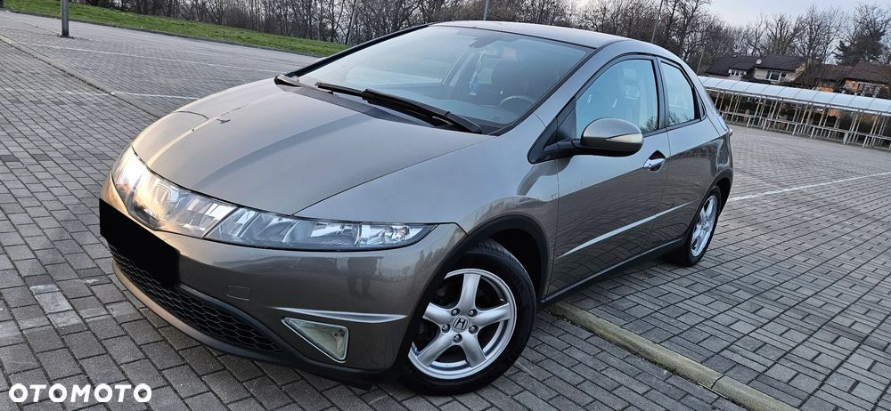 Honda Civic 1.4i-DSi Comfort - 1