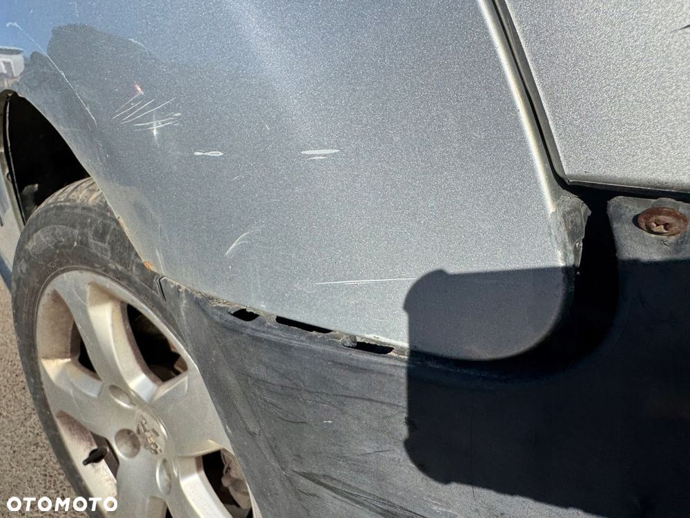 PEUGEOT PARTNER II BŁOTNIK PRAWY PRZÓD PRZEDNI EZR - 14