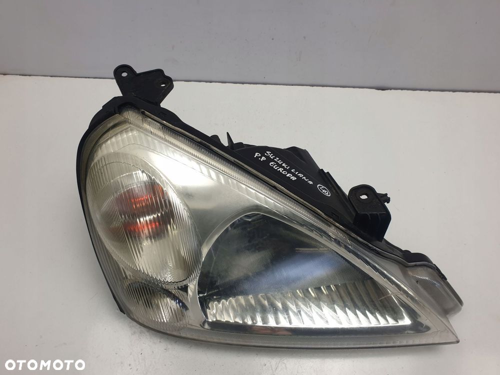 LAMPA PRAWA Suzuki Liana PRZEDNIA przód EUROPA - 2