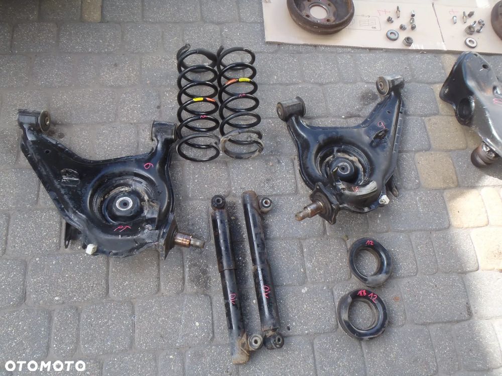 sprężyna sprężyny amortyzator tył tylne fiat panda II seicento cinquecento punto I II lift orginał - 12