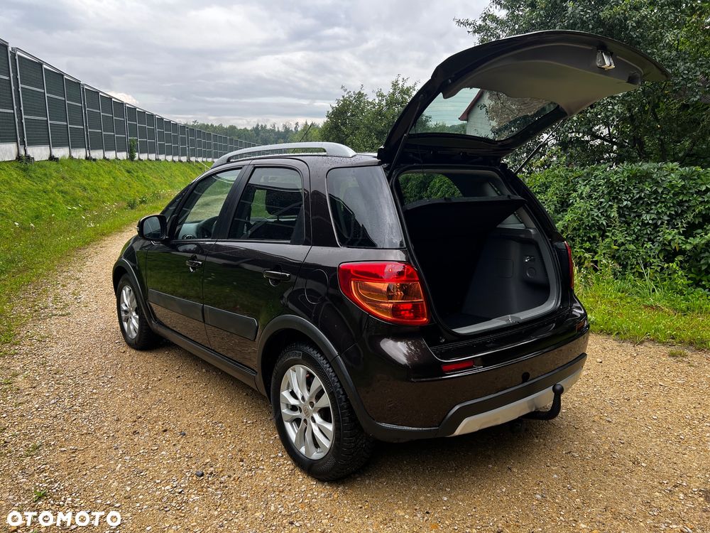 Suzuki SX4 1.6 Comfort Plus - 11