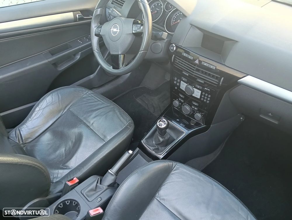 Opel Astra 1.8 Sport - 12