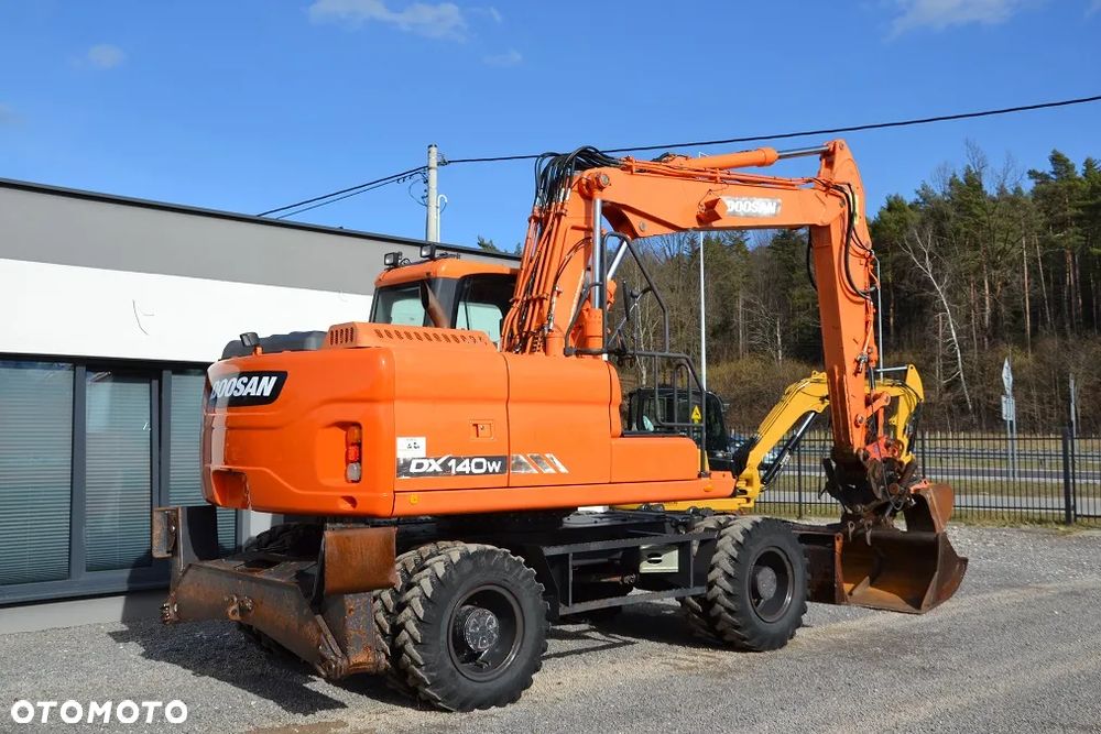 Doosan DX 140 W - 10