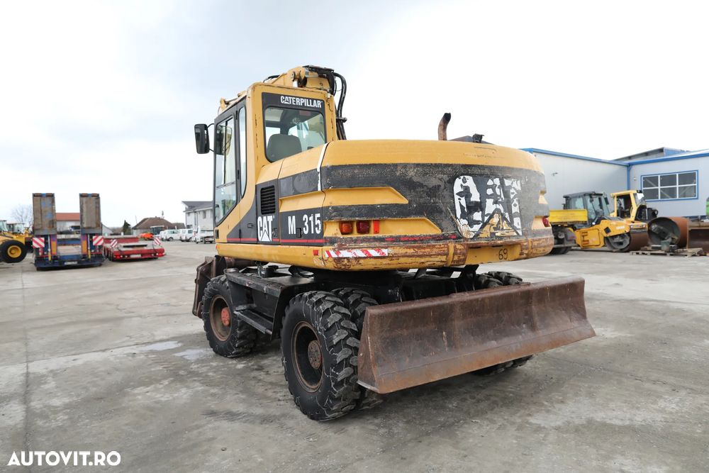 Caterpillar M315 - 4