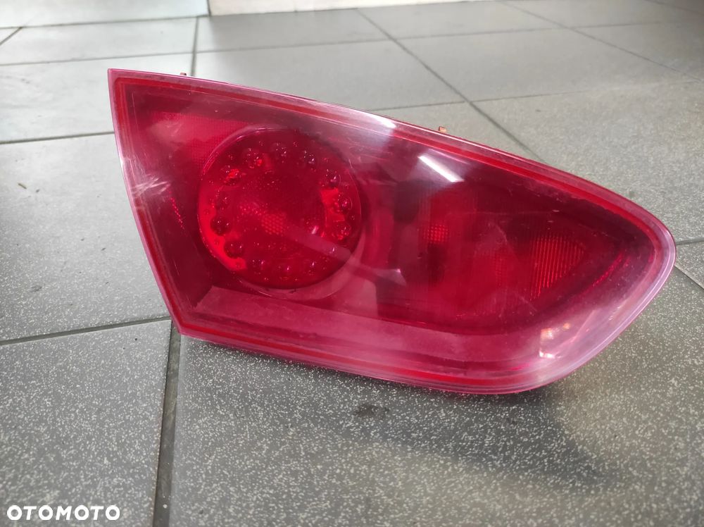 LAMPA LEWA TYLNA LEWY TYŁ W KLAPĘ SEAT LEON 2 LIFT HELLA WYSYŁKA !!! - 1