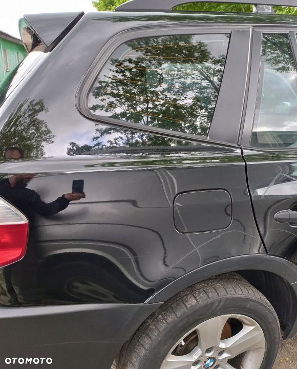 BŁOTNIK TYLNY PRAWY BMW X3 E83 668/9 - 1