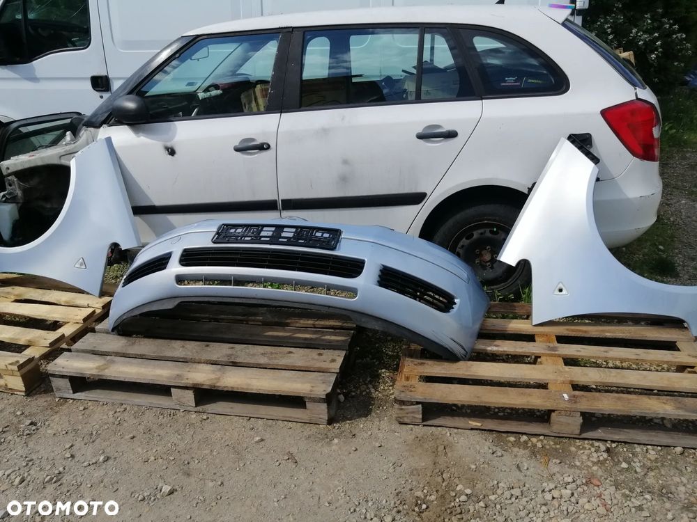 Mitsubishi Colt VI Z30 2002-2012r. błotniki drzwi maska zderzak kod lakieru 21H