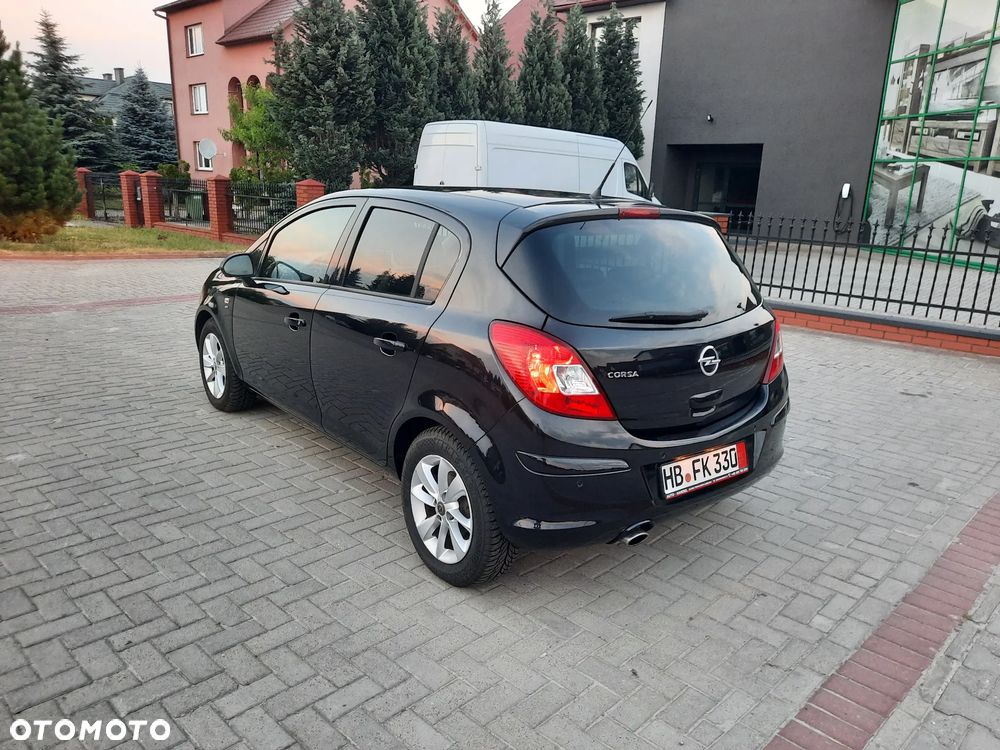 Opel Corsa 1.4 16V Energy - 11