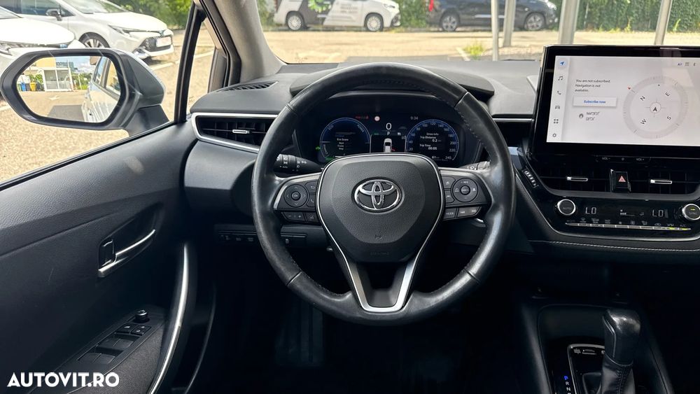 Toyota Corolla 1.8 HSD Business - 11