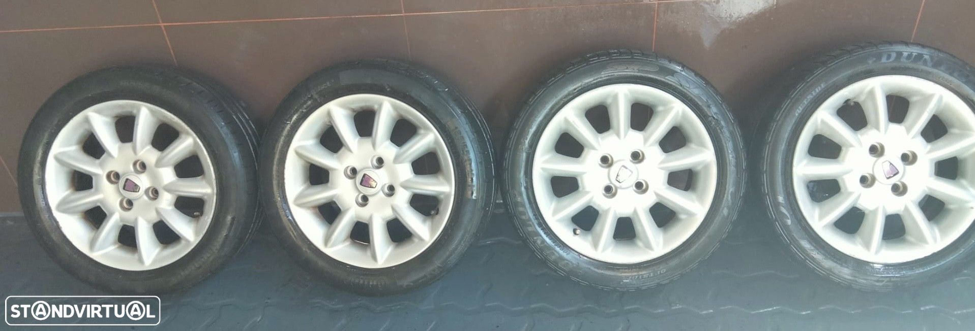 Jantes Rover 4x100 R15 com pneus 185/55 - 1