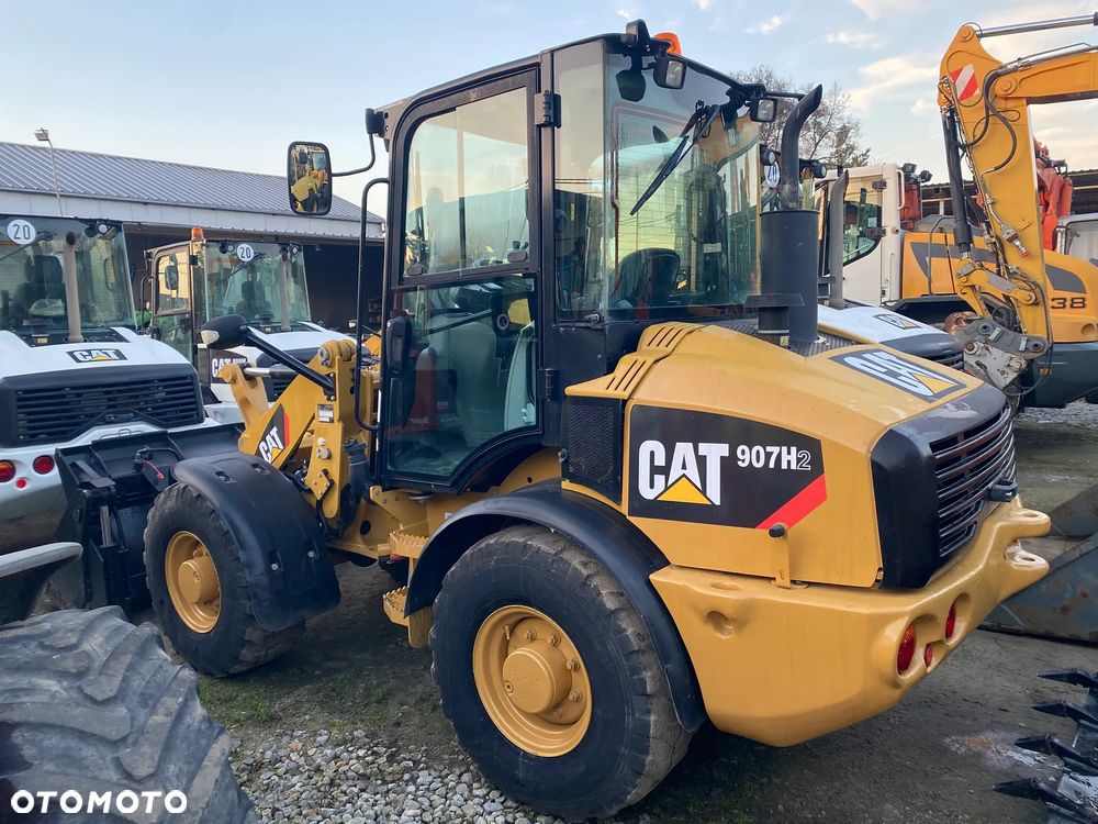 Caterpillar CAT 907H2, 6200 MTH, ŁYŻKA OTWIERANA + WIDŁY, z NIEMIEC, - 5