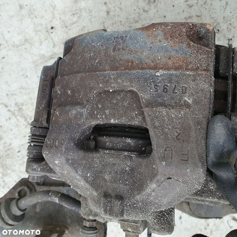 zwrotnica amortyzator lewa Opel Astra J 1.6 cdti - 9