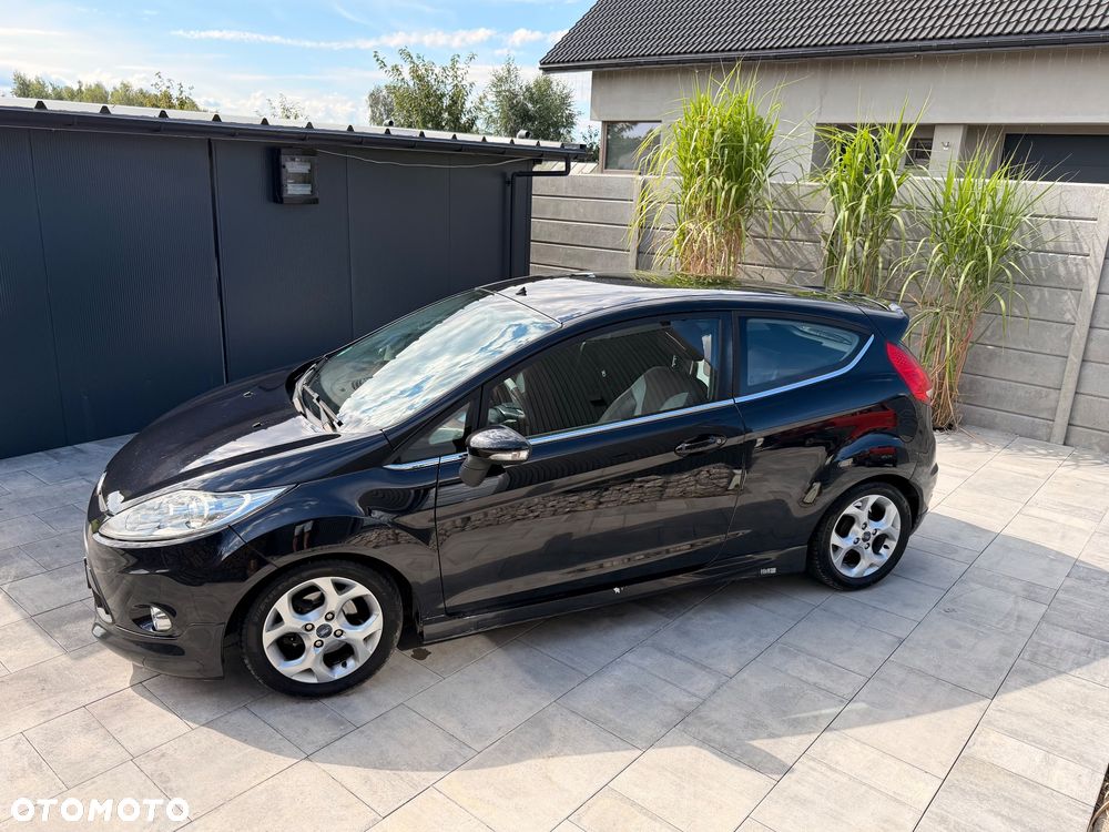 Ford Fiesta 1.4 Ghia - 8