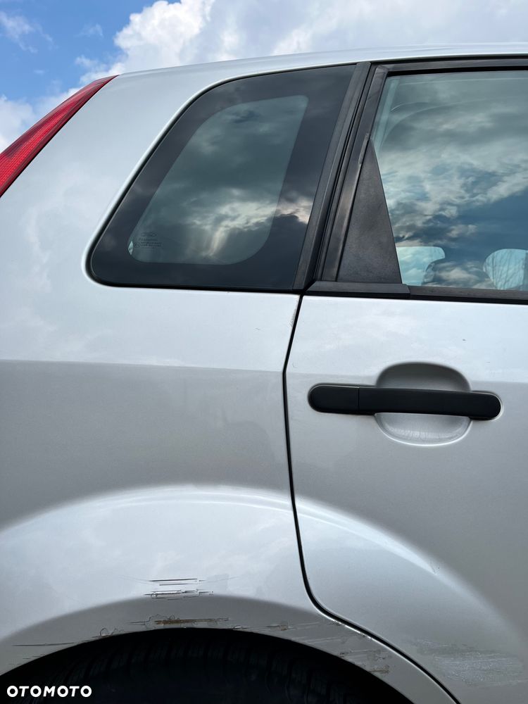 Ford Fiesta 1.4 Ghia - 40