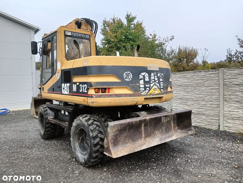 Caterpillar M312 - 8
