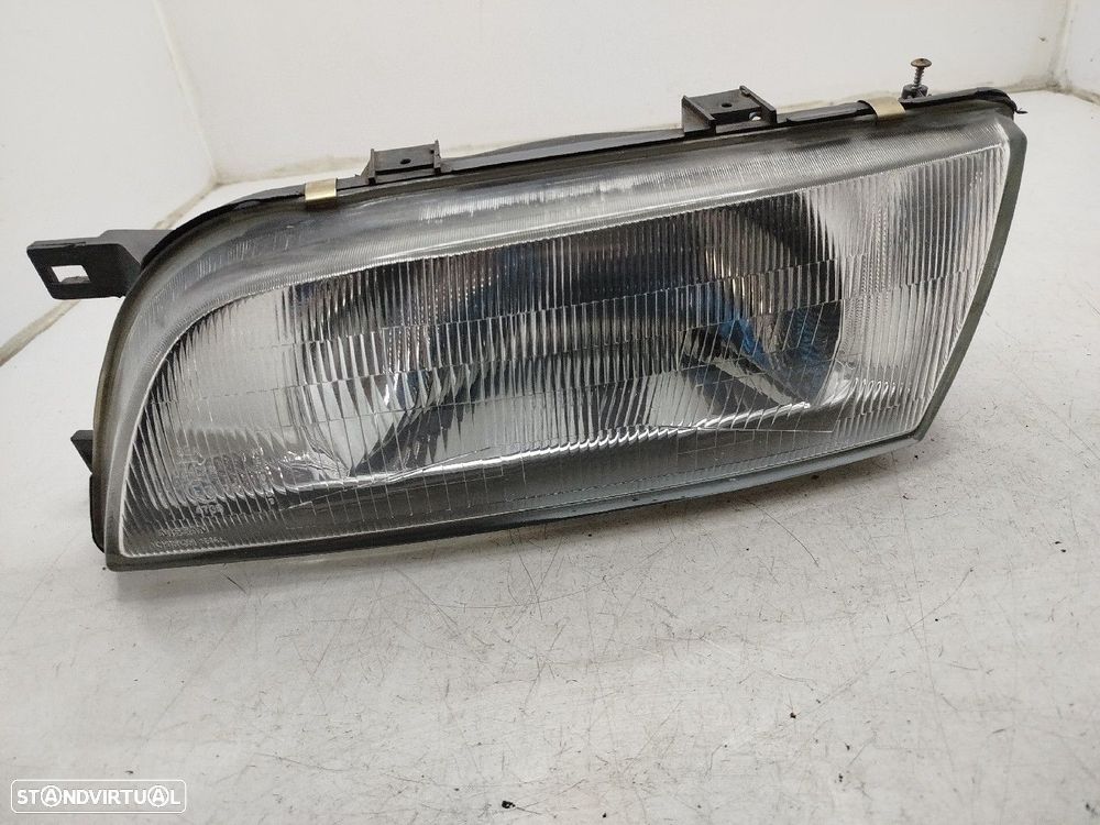 Farol/ Otica Dianteiro Esq Nissan Almera I Hatchback (N15) - 1