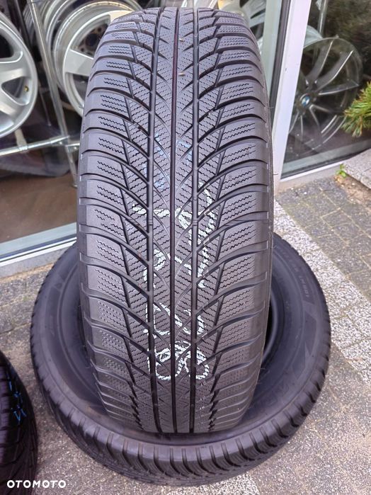215/65R17 99H Bridgestone Blizzak LM 001 para zima PZ28 - 1