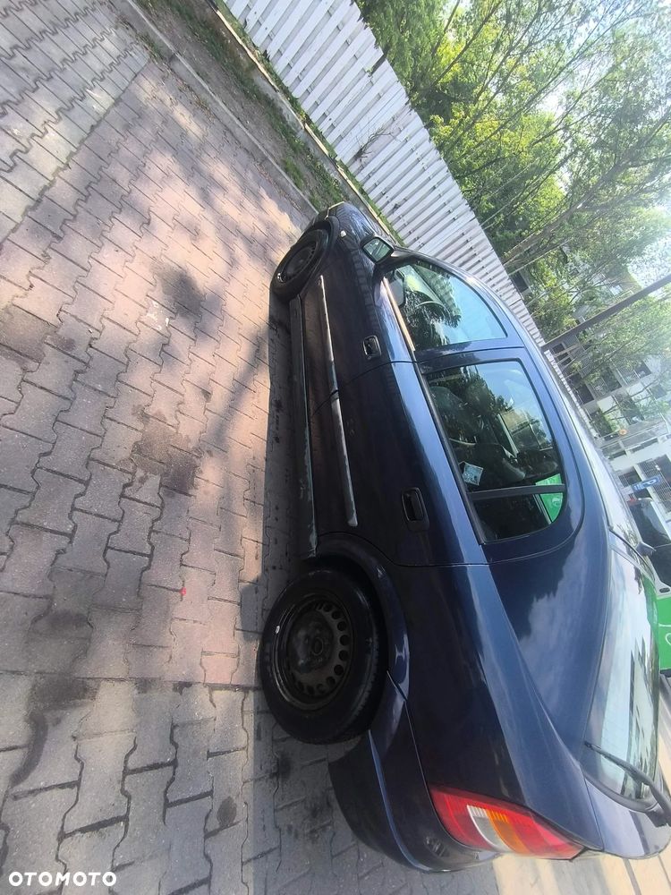 Opel Astra 1.8 Elegance - 18