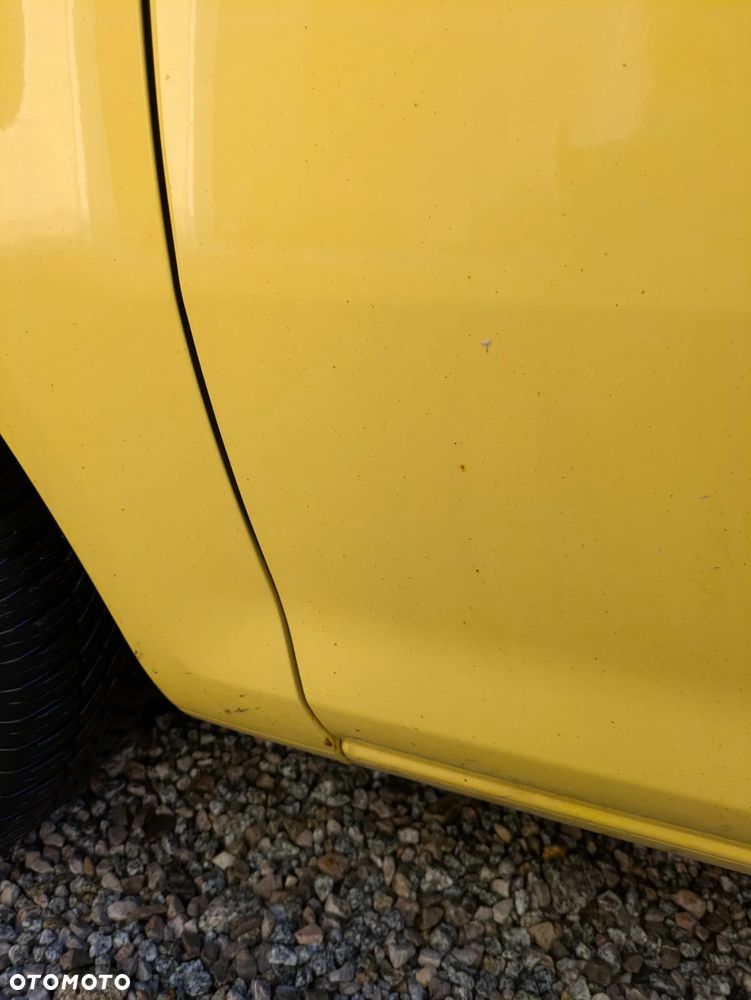 Opel Corsa 1.2 16V Enjoy - 18
