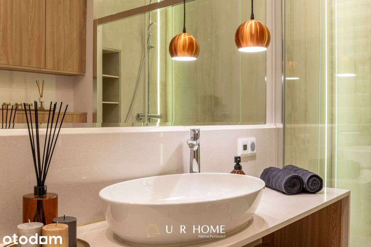 Elegancki apartament z garderobą, garażem i komórk