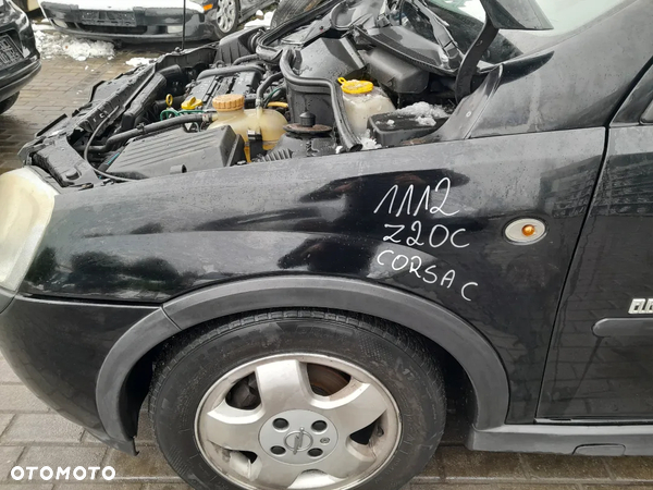 Błotnik Lewy Przedni Przód  Opel Corsa C Z20C 3Drzwi