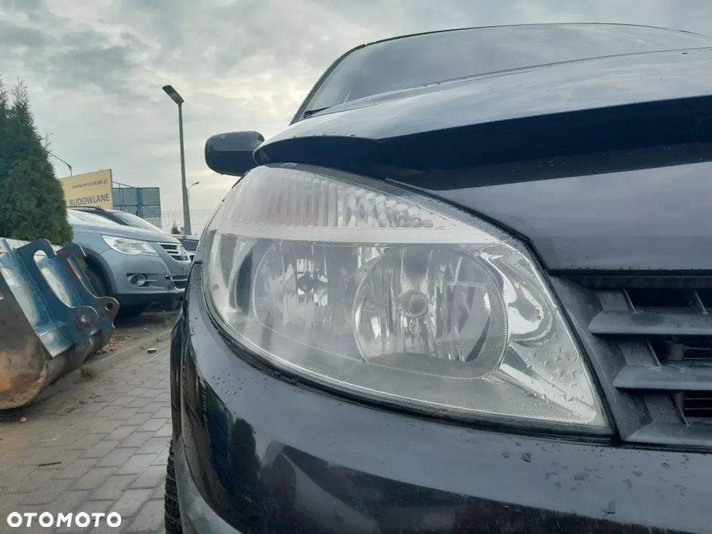 RENAULT SCENIC II LAMPA REFLEKTOR PRAWA PRZEDNIA - 1