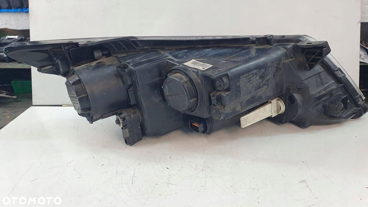 KIA Optima 3 III 10- lewa lampa przednia przód reflektor € - 9