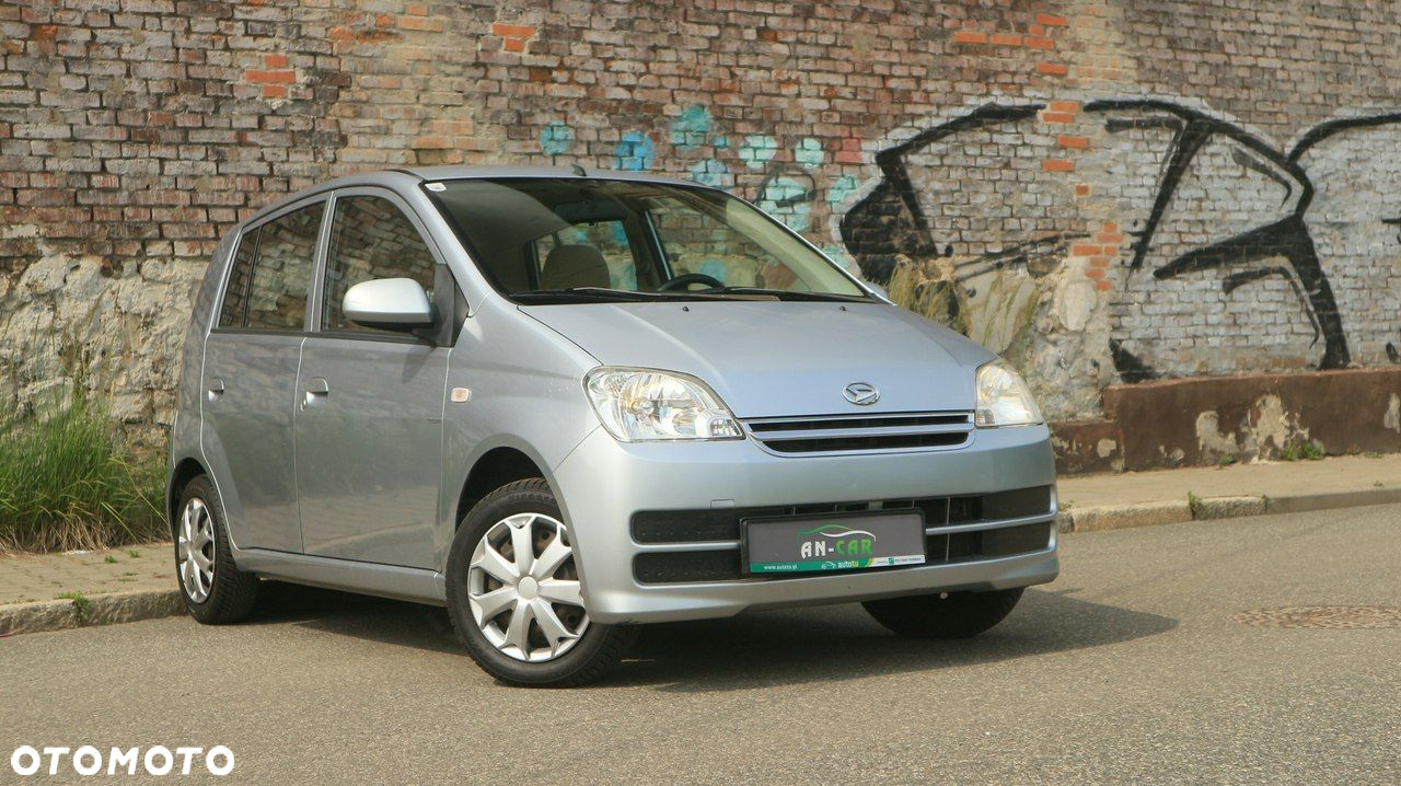 Daihatsu Cuore 1.0 Top - 8