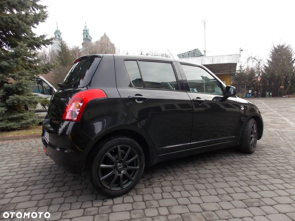 Suzuki Swift 1.3 DDiS Comfort - 11