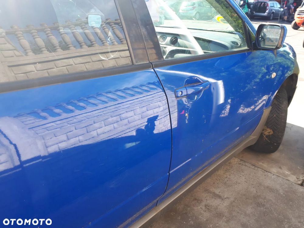 MITSUBISHI OUTLANDER I 03-06 ZAMEK DRZWI PRZÓD TYŁ PRAWY LEWY - 13