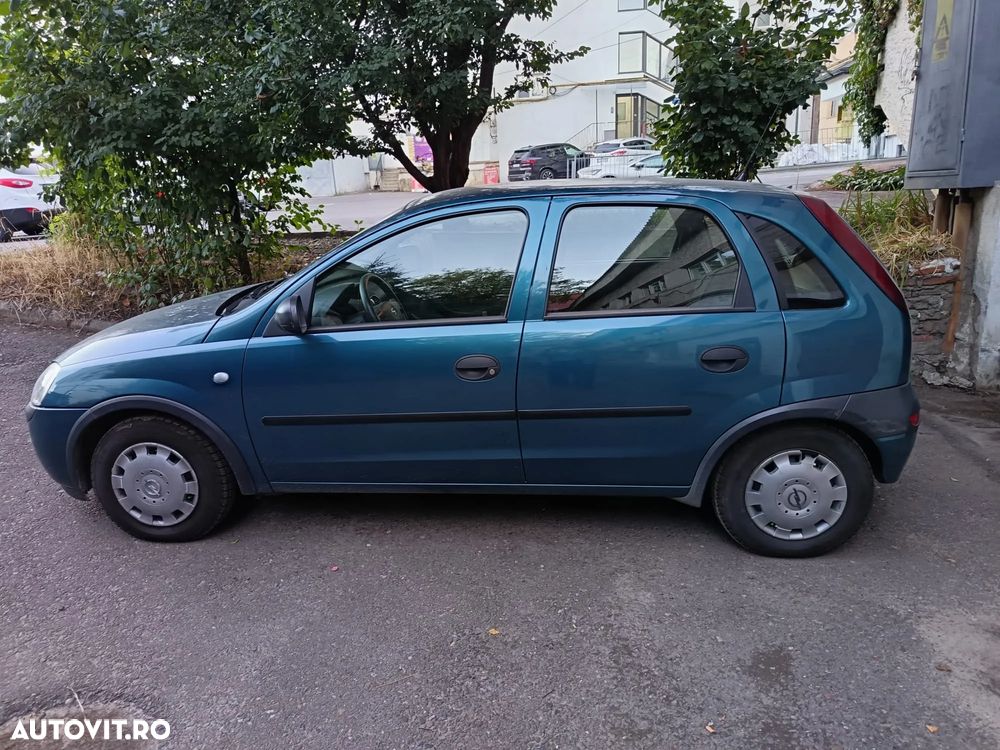 Opel Corsa 1.0i Enjoy - 1